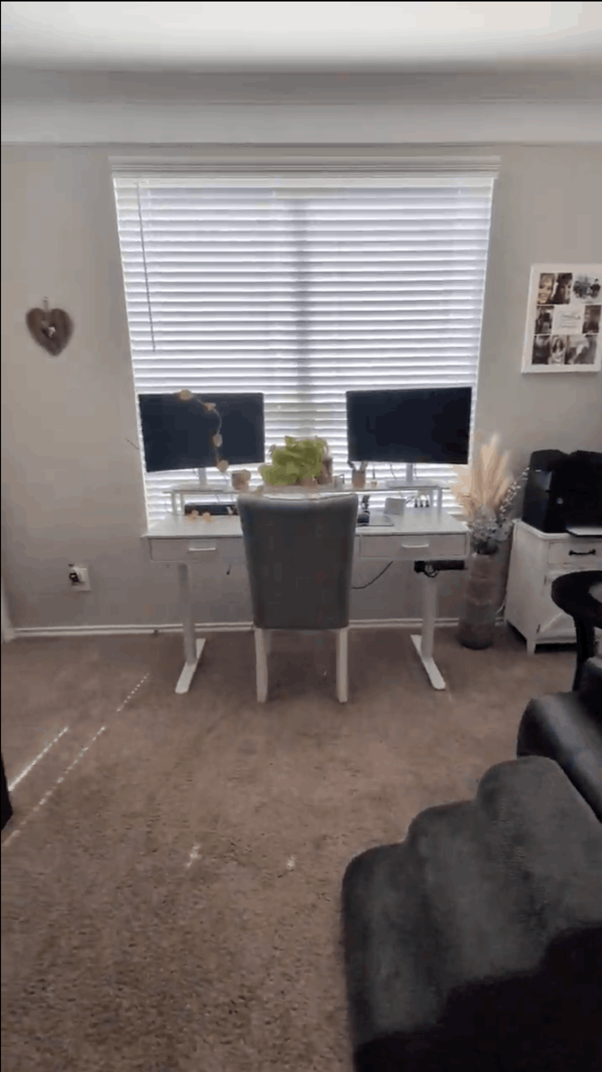 Professional home organizer creating a tidy work station in a Dallas-area home.
